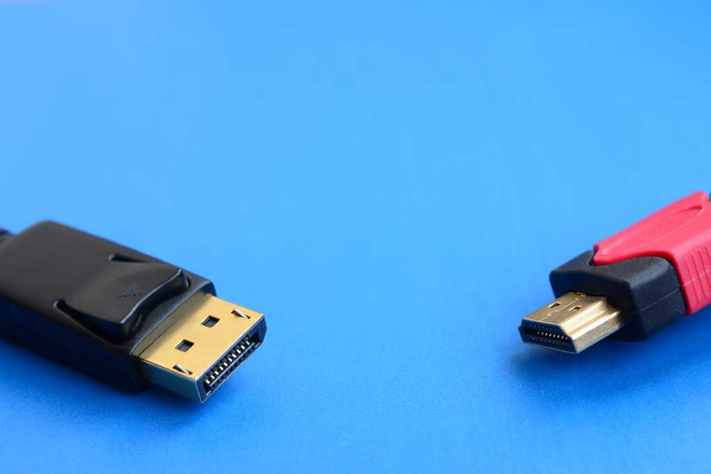 Displayport And Hdmi Cable Connections Head To Head On Blue Background.jpg