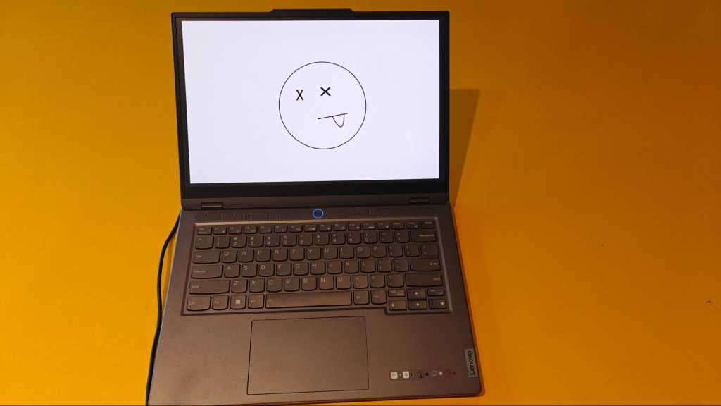 Laptop With A Dead Face Drawn On The Screen.jpg