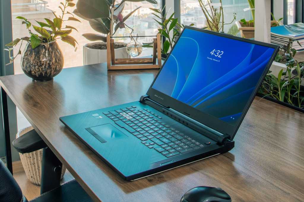 Windows Laptop On Wooden Desk Table In Plant Filled Home Office 2.jpg